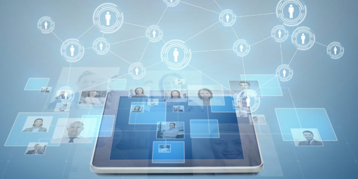 pictures of businesspeople over tablet pc