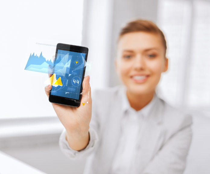 close up of businesswoman with smartphone