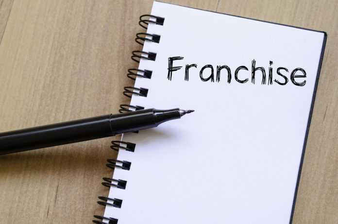 Franchise write on notebook
