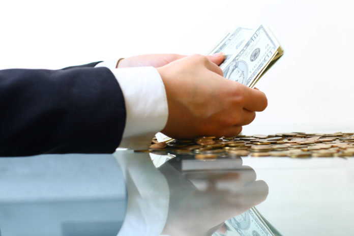 hands hold money