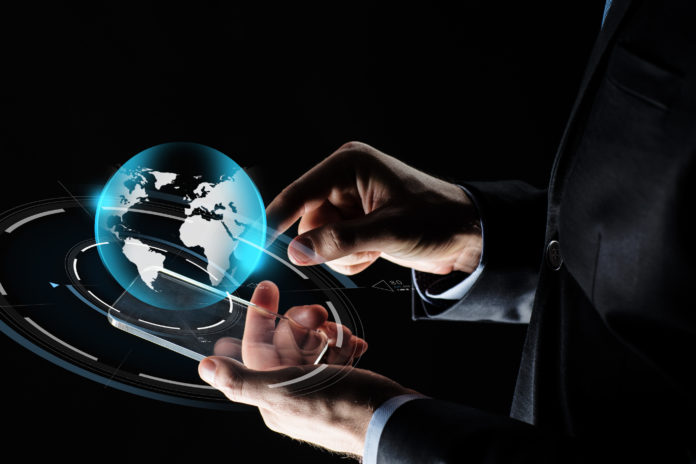 businessman hands with smartphone and earth